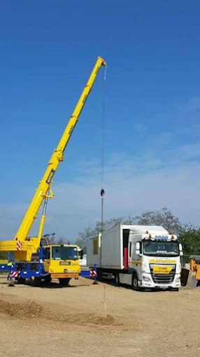 Levage de bungalow à la grue mobile